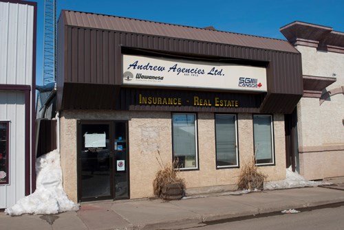 Andrew Agencies has left its location at 128 Main Street for 207 Main Street.