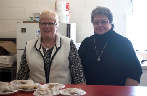 Beth Corrigan (left) and Dianne Wilson were present as volunteers for the History Book Committee who were selling lunch and desserts to raise money for the new book to be printed.