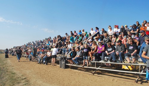 Fans packed the stands at the Big Eagle quarter mile dirt race track for an afternoon of high speeds and adrenaline rushes.