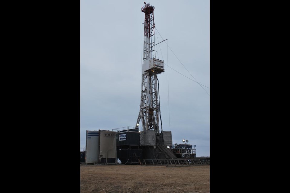 The crew of Ensign rig #34 at a PetroBakken site near Kisbey were busy at a critical point in the drilling when the camera arrived.