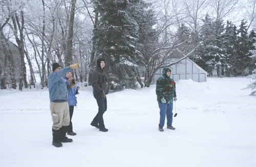 Local birding enthusiasts took part in the recent nation-wide Christmas Bird Count. The annual count, which documents bird numbers cited by people across the country become part of a database important to conservation efforts. Here Geoff Rushowick points out some blue jays as Dorothy Skene, Kaarina Rahn and Pat Rushowick look on.