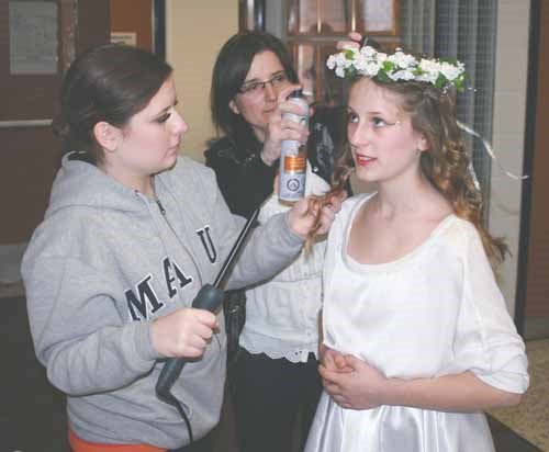 Nicole Dobrowolski of Prince Albert has her hair prepared by Janice.