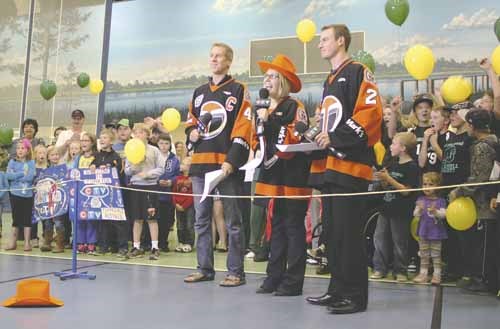 Hundreds cheer showing their Yorkton pride as CTV Regina&#8217;s Dan McIntosh, left, and Danelle Boivin, joined by Yorkton&#8217;s own Jordan Dobrohoczki, kick off the Hometown Tour broadcast at Gallagher Centre September 29.
