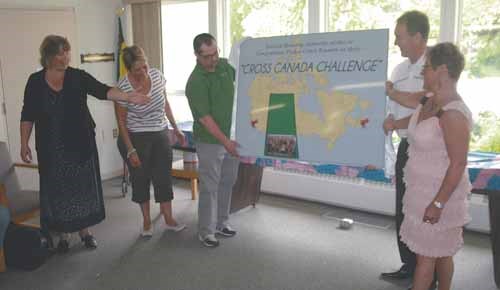 Residents from Fisher Court in the city were recognized last Wednesday for the successful completion of the &#8216;Cross Canada Challenge&#8217;. Three years ago, Yorkton Housing Authority challenged each Senior Court to walk across Canada. The challenge was to do 15 to 20 minutes of elevating their heart rate each day. It was a symbolic activity, with all six YHA residences taking part. Fisher Court, home to 35 residents created a walking club, with others riding their bicycles, the facility&#8217;s stationary bike, aquacize at the Gallagher Centre Water Park and other activities. Fisher Court won the challenge. To mark the success Yorkton Housing Authority, in coordination with the City of Yorkton Community Development, Parks & Recreation unveiled a &#8216;Hallmark Image&#8217;, which will be mounted at the trail head on Logan Green. From left Shauna Jewhurst, Tennant Activity Coordinator, Jo-Ann Carignan-Vallee, Saskatchewan Trails Association Trans Canada Trail Coordinator, Darren Spelay Recreation Services Manager with the City, Yorkton Mayor James Wilson, and Mary Haley, Fisher Court manager unveil the sign.