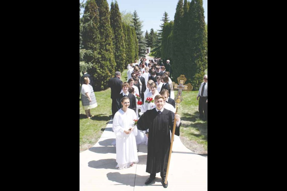 Sacred Heart High School&#8217;s Class of 2014 prepares to enter St. Mary&#8217;s May 31 for a graduation liturgy, which was followed by convocation in the afternoon and a supper in the evening. Full coverage in the June 11 edition of Yorkton This Week.