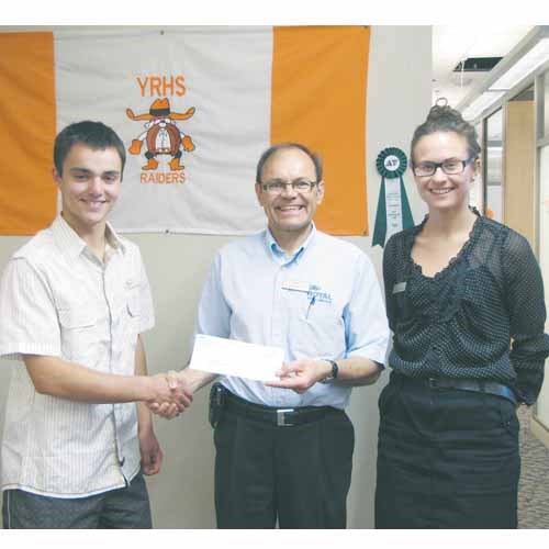 Terry Ortynsky, Manager of Royal Ford and Stephanie Ortynsky 
present a cheque for $4,740.00 to S.R.C. President Cordell Young. This was a fundraiser sponsored by Royal Ford for the Yorkton Regional High School for the Drive One 4 Ur School test drive program. The Yorkton Regional High School and the Family of Raider would like to thank Terry Ortynsky&#8217;s Royal Ford for the great opportunity that was given to them through this fundraiser!