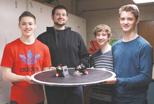 The Yorkton Regional High School robotics program continued its provincial dominance March 20 taking gold and bronze at a tournament in Saskatoon. Seniors Bo Chiasson (left) and Michael Koshuska battled their way through the field of 88 Sumobots representing 32 Saskatchewan schools to take first place. Grade 9 students Brock Chiasson (right) and Brett Guenther took third place in their first competition. The Sumobot challenge is to program an autonomous robot to push its opponent out of a scaled Sumo wrestling style ring.  Next up for YRHS Robotics is the Skills Canada provincial championship starting April 10 in Prince Albert with a goal of representing Saskatchewan for the third consecutive year at the National Skills competition in Toronto June 4 to 7.