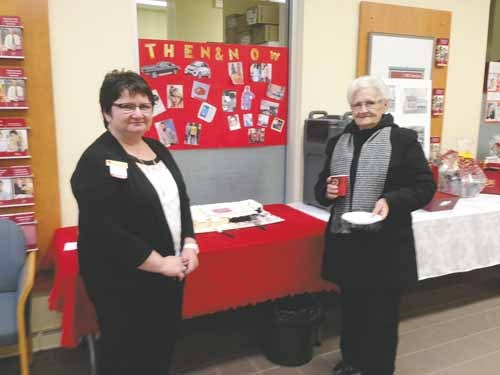 On Monday, February 10, CIBC celebrated fifty years in Yorkton. To mark the occasion cake and coffee was served. Pictured above is CIBC Branch Manager Candace Tendler  enjoying a coffee with a CIBC customer.