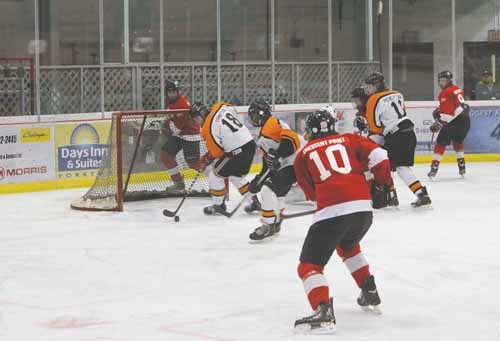 The Yorkton Terriers of the Saskatchewan Junior Hockey League came of the league&#8217;s Christmas break losing a game in Melville Dec. 30. Since then the Terriers, who sit atop the SJHL&#8217;s Viterra Division, have won three straight. The wins include a home ice win New Year&#8217;s Day against Melville 3-1. Here Terrier Brett Boehm, 23, is turned away by Melville netminder Isiah Plett, 34.