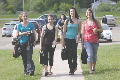 Yorkton Regional High School once again led the way on Walk & Roll Day last Wednesday, the annual event when all staff and students are encouraged to leave their cars at home and reach school by active means such as walking or biking. Walk & Roll Day has spread from YRHS throughout the Good Spirit School Division, with participation in some schools exceeding 80 percent. Dr. Brass School, which arranged for its buses to drop students off downtown so that the entire school could walk in together, was the winner of a bicycle donated to the cause.