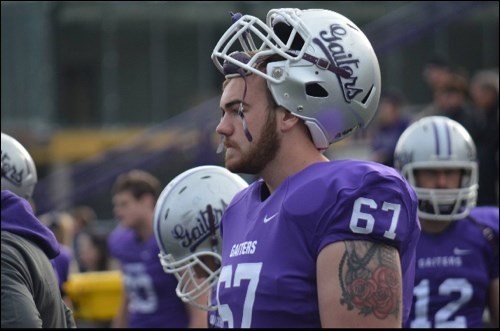 Tyson Thompson observes play on the sidelines. The Ƶappnative recently completed his second season with the Bishop’s Gaiters.