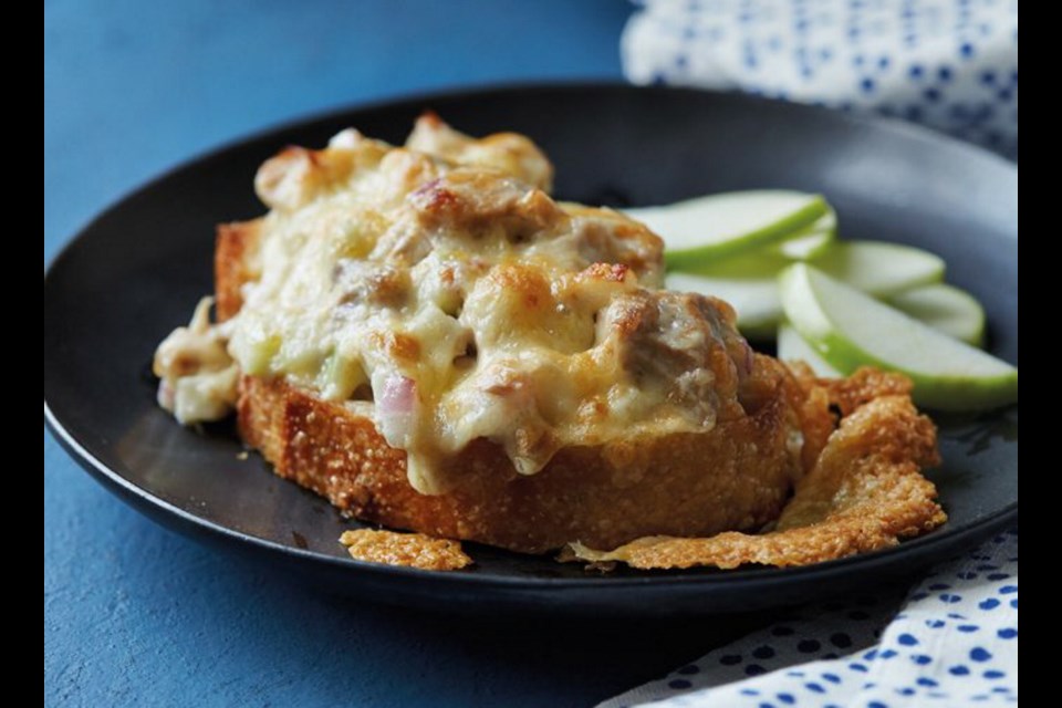 Apple, red onion and celery are mixed with tuna and mayonnaise, mounded onto a slice of baguette and broiled under a layer of bubbling cheddar cheese.