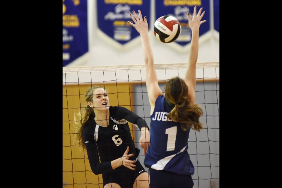 York House Tiger Siobhan Finan (No. 6) fires the ball past Notre Dame blocker Mia Ricci (No. 1) in a playoff game at York House Nov. 6, 2014. Photo Dan Toulgoet
