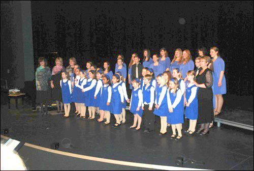 The Kamala Youth Choir and Battlefords Children&#8217;s Prepatory Choir performed at the Dekker Centre for the Performing Arts Sunday evening for an event titled Keys and Chorales. The choirs are under the direction of Dianne Gryba and JoAnne Kasper. A major part of the presentation was a piano duo performance by Gryba and Bonnie Nicholson who, together, are Les Quatres Mains. Nicholson is a respected teacher in Saskatoon and at the University of Saskatchewan music department. They have been playing piano duets and two-piano works for more than 30 years. Also taking part was cello player Zaide Masich and special guest Cathy Richardson, city councillor and Battlefords Kiwanis Music Festival volunteer, who led the final performance as soloist as part of Choral Week in Saskatchewan. Running Feb. 8 &#8211; 14, Choral Week in Saskatchewan is a week to celebrate and advocate choirs and choral singing in Saskatchewan. A photo was taken at the end of the concert with special guest Richards, a &#8220;person of influence,&#8221; as Gryba said, to submit to the Saskatchewan Choral Federation for a chance to win new music. Gifts were also presented to long term singers as well as graduating singers Katrina McKinnon, Johanna York, Pilar Bernal, Danova Dickson and Kayla Schmidt.Gryba and Kasper also announced the children&#8217;s choir will be staging a performance of the Wizard of Oz this spring. Photo by Jayne Foster