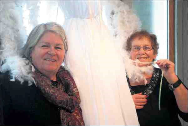 Karen Kowalski and Rita Young found an angel (actually, Kowalski created it) at a tea Tuesday afternoon in honour of the Angels Dwell Here exhibition in the Windows Salon of the Chapel Gallery. The gallery members&#8217; show features a variety of media, from acrylic to oil, from watercolour to photography and from fabric to feathers. It&#8217;s a theme that is truly open to interpretation, a circumstance the artistic results of the show made clear to visitors who turned out for tea and, later, for an evening reception. Galleries manager Leah Garvin says the show was originally conceived prior to her taking on the galleries manager&#8217;s position. Former curator Michael Brokop, who retired in 2012, had undertaken to put it into the program schedule, which is often lined up years in advance. Angels Dwell Here will be on display at the Chapel Gallery at 891 - 99th St. until Feb. 2. Admission to the Chapel Gallery is free, although donations are appreciated. Also on at the Chapel Gallery is a mask and puppetry exhibition featuring creative works from 15 artists and dozens of individual pieces in media such as, clay, wood carvings, steel, glass, fabric, papier-mâché, soapstone and recycled material. The gallery&#8217;s winter hours are Wednesday to Sunday from noon until 4 p.m.