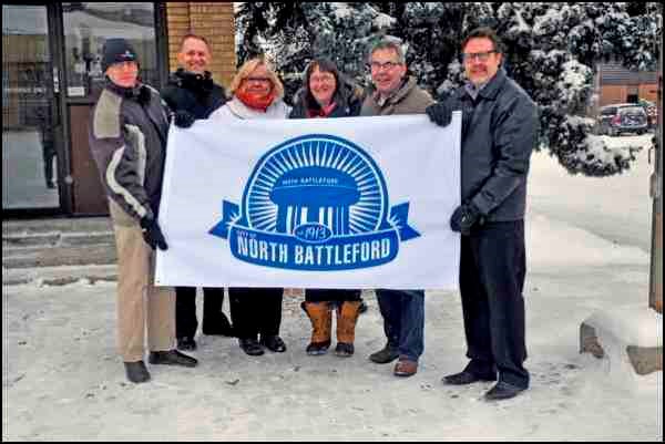 Civic officials braved the ice and cold Wednesday morning to raise the flag commemorating the city&#8217;s Centennial year of 2013. The flag-raising is in conjunction with the Centennial Winter Carnival taking place on Feb. 3 at the Civic Centre. The event is being held in conjunction with the eighth annual Aboriginal Storytelling event in the city. Shown here are Mike Halstead, coun. Don Buglas, Leah Milton, Tammy Donahue-Buziak, Mayor Ian Hamilton and Darren Olson.