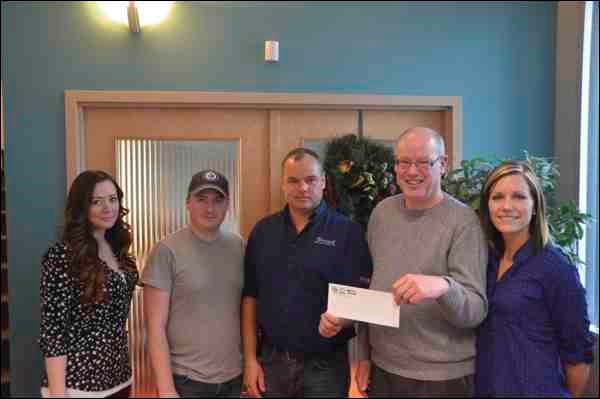 CJNB&#8217;s annual Ball-breaker fundraiser for the Empty Stocking Fund had a good year in 2012, raising a total of $4,500 in cash donations and over $8,000 of food and toy donations. The fundraiser also gave away a new snowmobile. In terms of cash donations, the 2012 fundraiser was second only to 2011&#8217;s in the total amount raised. From left to right, Mandee Forester and Perry Thiessen, of CJNB, Leon Lozowchuk of Norsask Farm Equipment, who provided the snowmobile, Bill Hall of the Battlefords Food Resource Centre and Jayna Hannah, of CJNB.