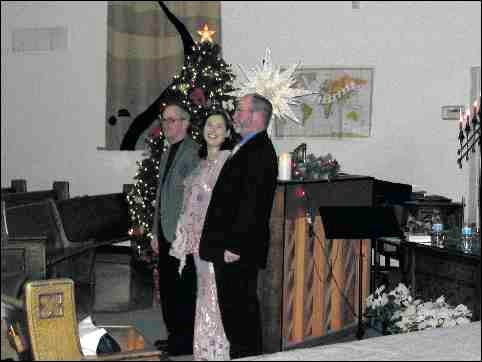 For their annual Candlelight Christmas concert on Dec. 23, local mezzo soprano Lisa Hornung (centre) and accompanist Gary Gansauge (left) invited Dave Tupling to join them in an offering of sacred music at Third Avenue United Church.