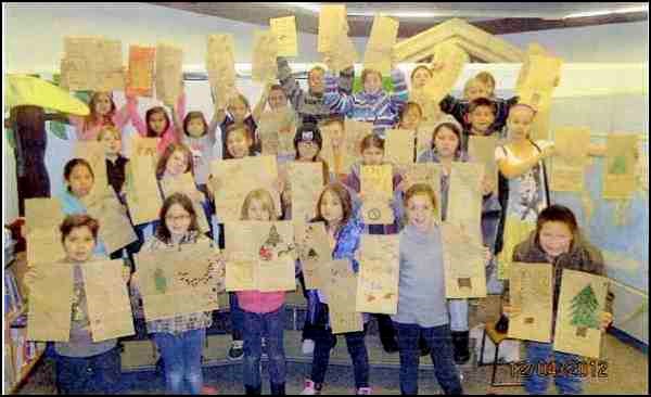 Connaught School's Me to We Club was busy decorating brown paper bags, which they obtained from the liquor board store, as a way of sending out a message for the people in the community to be safe during the holiday season.