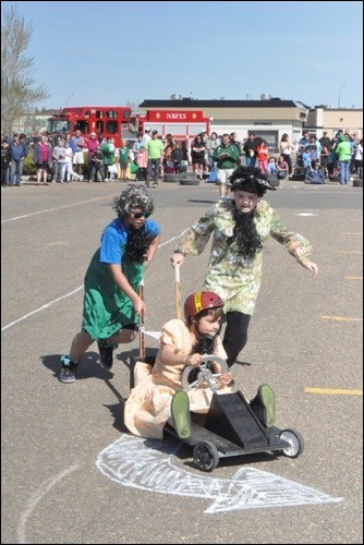Pictured is the best-dressed team, the Bearded Ladies, during one of their races.