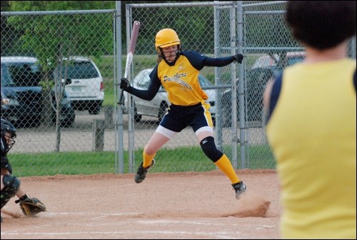 A Unity Bantam Panthers' batter jumps over a wild pitch.