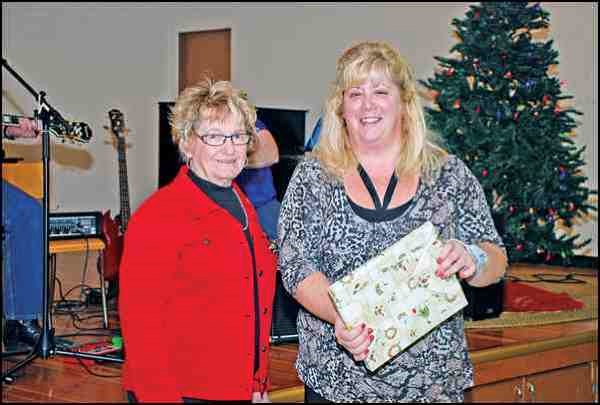 Battlefords Residential Services Inc. employees were honoured for long service at the annual BRSI client Christmas Function held Dec. 12. Yvonne Nyholt,  BRSI chairperson, presented Darcy Williams with a 10-year service award ...