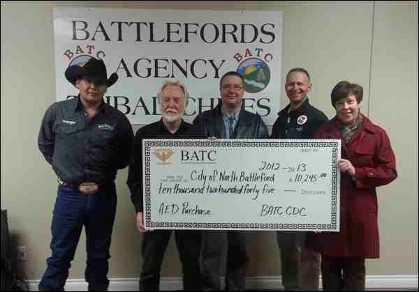 BATC Community Development Corporation has contributed $10,245 for the purchase of  five automated external defibribulators for each component of the Credit Union CUPlex. Pictured are: Chief Stewart Baptiste of Red Pheasant Cree Nation, a BATC CDC board member; Keith Anderson, parks and recreation director for the City of North Battleford; Bill Samborski, facilities general manager for the City of North Battleford; Don Buglas, councillor for the City of North Battleford and a BATC CDC board member; and Siobhan Gormley, recreation co-ordinator for the City of North Battleford.
