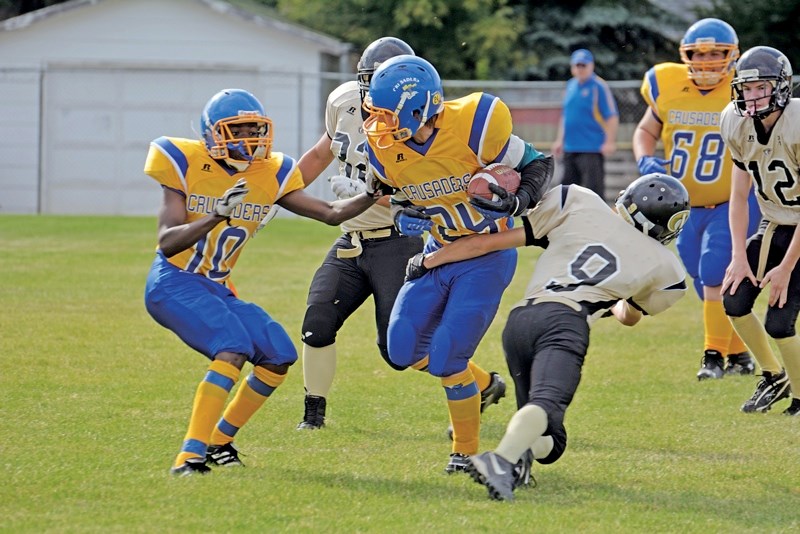 The John Paul II Collegiate Crusaders squared off against the Kindersley Collegiate Cobras in a controlled scrimmage Thursday afternoon. The Crusaders open their season Sept. 12 in Warman. Their first home game is Sept. 19 against Meadow Lake at Beaver Lions Stadium. Kickoff is 4 p.m.