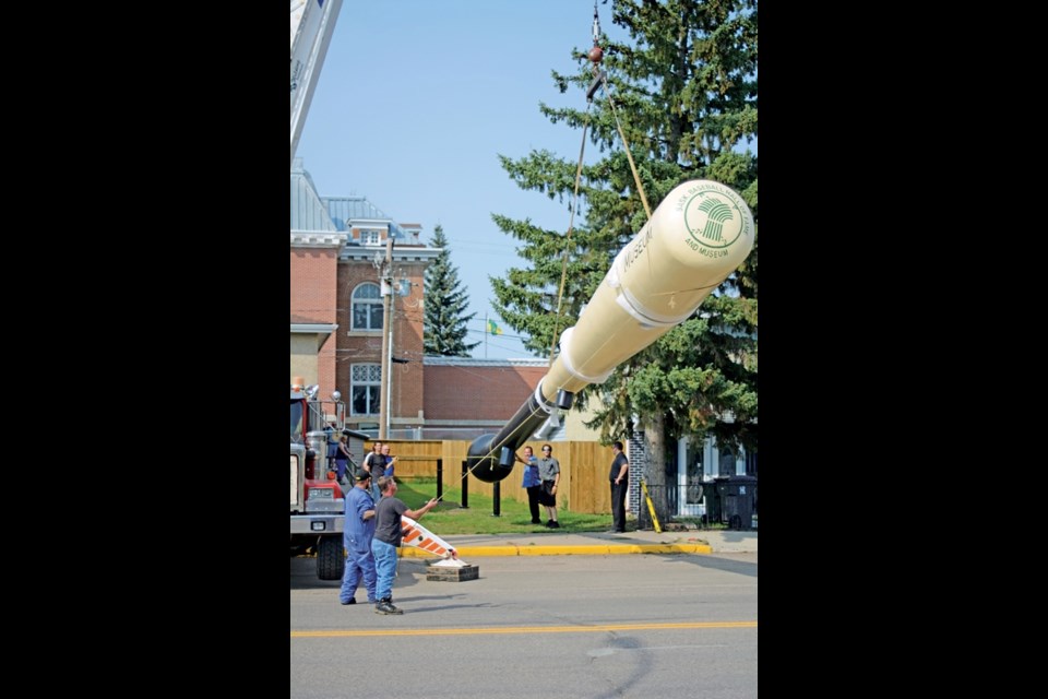 The Saskatchewan Baseball Hall of Fame and Museum installed the biggest bat in Canada Thursday afternoon.
