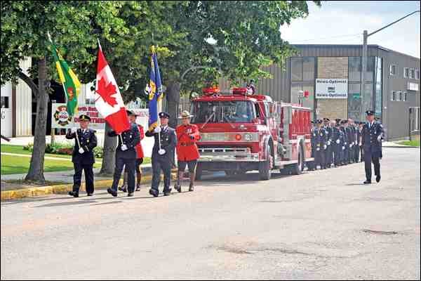 A full fire department funeral with honour guard and procession marked the memorial service for retired fire fighter Bill McIntyre who passed away at the Battlefords Union Hospital Friday, Aug.1 at the age of 70. McIntyre started his career with the North Battleford Fire Department as a volunteer in March 1964 and was hired on full time in April 1985. He retired on March 17, 2005 from a distinguished career serving the City of North Battleford and surrounding area residents with 41 years service. He is survived by his wife Starla, daughter Karen, son Kevin and grandchildren. The memorial service was held at the Knights of Columbus Hall. The honour guard and procession formed up at the fire hall in North Battleford and made its way to the Knights of Columbus Hall.