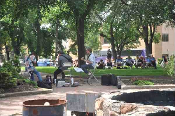 It was the second Live@Lunch event in two weeks at Central Park next to the North Battleford Public Library Wednesday, part of an ongoing series of events happening this summer from the Downtown North Battleford Business Improvement District. Included was a performance by the group Wires and Wood. Also on hand to cook up some burgers for the event were the folks from RBC. The next Live@Lunch is Wednesday, July 9, featuring the always popular Meota Hobby Band.