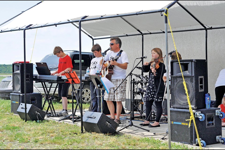 Fort Battleford was the host for Canada Day celebrations in Battleford Tuesday. All of the historical buildings were open to the public to explore over the course of the afternoon. Sets by The Keller Family Band opened and closed the day, playing songs from a number of different genres.