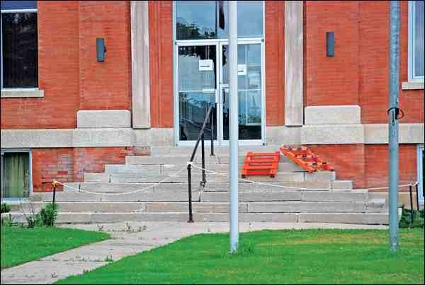 Residents have probably been wondering when steps of Town Hall in Battleford were going to be usable again. Last week, council approved a tender for CAP Masonry to undertake the work for a quoted amount of $40,000 plus GST. The repair will include filling a void beneath the stone steps. The original purpose of the void seems to be a mystery. The steps are made of Tyndall stone, a limestone geologically referred to as the Upper Mottled Limestone of the Red River Formation of the Ordovician System. It is quarried in Manitoba. The decorative random mottling characteristic in Tyndall stone is unique among building limestone, containing the fossils of marine animals from 450 million years ago. Tyndall stone has been used on some of the most famous buildings in Canada, and it is prominently featured not only at Town Hall in Battleford, but on the Battleford Post Office and the Court of Queen's Bench building.
