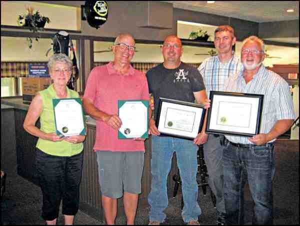 North Battleford Housing Authority board members and staff members were recently recognized for long-time service to the organization. Shown above with certificates are: front row - director Grace Macfarlane (15 years service), board chairman Murray Greenwood (20 years), maintenance co-ordinator Larry Kopp (seven years) and maintenance worker Brent Nelson (five years).  Also pictured (second row) is manager Jeremy Reynoldson. Also recognized but missing from the photograph were director Diane Cawood (15 years), maintenance workers Randy Friedt (seven years), Larry Halter (six years), Charlie Horrell (five years) and cleaner Pat Cooper (10 years). NBHA exists to ensure, on behalf of Saskatchewan Housing Corporation, that adequate, affordable and well-maintained housing is accessible to all residents of North Battleford. By delivering housing programs and services that support the dignity and worth of individuals and families, NBHA contributes to the physical, social, emotional, and economic wellbeing of its clients and society.