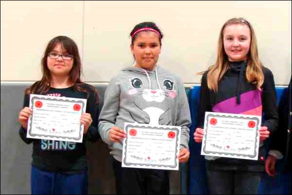 Zone Awards Earned<br>Battleford Central School students who earned awards at the zone level of the Royal Canadian Legion Remembrance Day competition are: Waneeke Baptiste, second for her Junior coloured poster; Kenzie Swiftwolfe, second for her junior essay; and  Amy Liebaert, second for her junior poem. Battleford Branch, Royal Canadian Legion No. 9 presented the awards.<br>