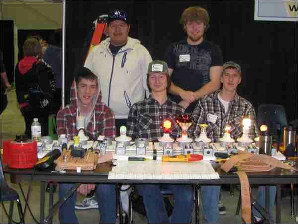 First year students of the North West Regional College electrician program were helping out at the Try-A-Trade Interactive Career Expo Wednesday, March 13 in North Battleford. Standing, left to right, Craig Tootoosis and Tyler Soli, seated, Ryan McGrath, Patrick Laughlin, and Riley Bartrop.