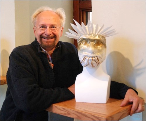 The current exhibition at the Chapel Gallery in North Battleford is Joy of Art by the Battlefords Art Club. The exhibition showcases pieces by some of the club&#8217;s 24 members who actively explore various media and subject matter and who strive to advance their own art practice, as well as the visual arts in the Battlefords. Above, Michael Brokop had several masks on exhibit, including this one of paper mache, fabric, paint and feathers entitled Phantasm.