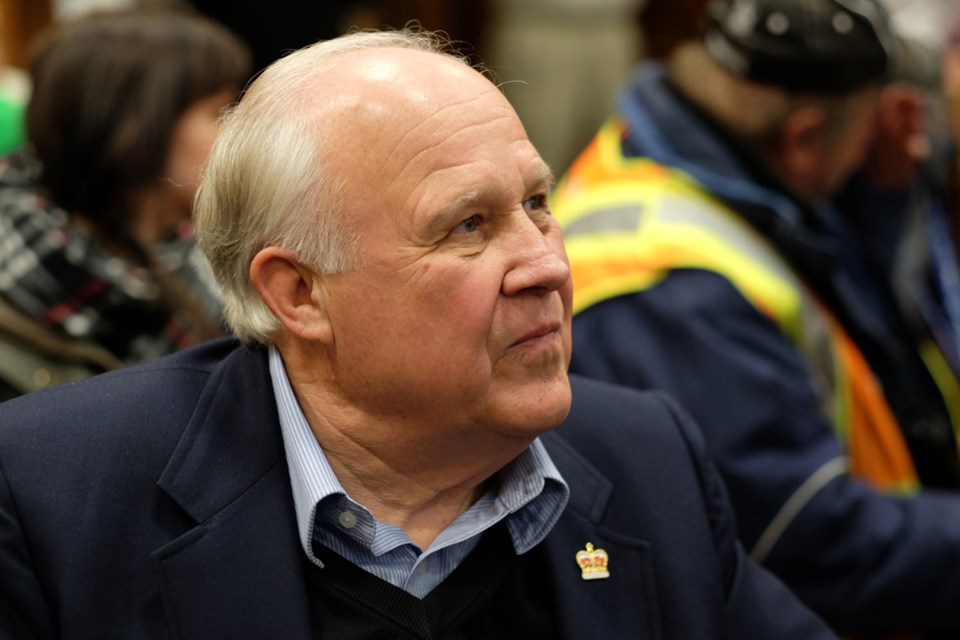 Wayne Wright watches the results come in at New Westminster City Hall as he loses the mayor's seat to Jonathan Cote.