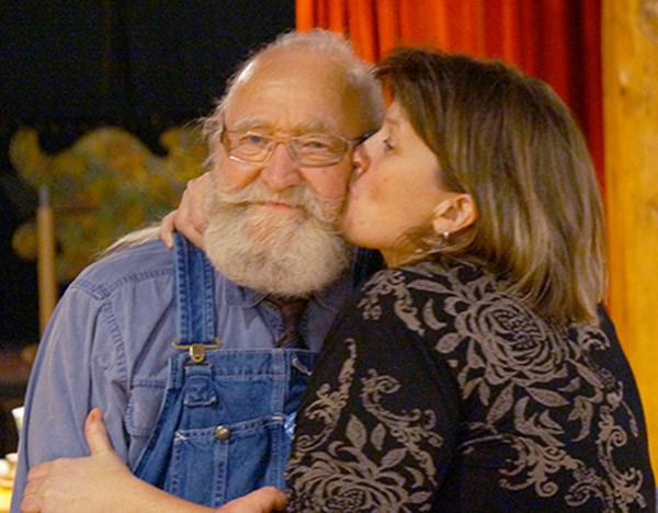 Mayor-elect Patricia Heintzman gives Brackendale Art Gallery owner Thor Froslev a kiss during the celebration of her election win at the gallery Saturday evening.