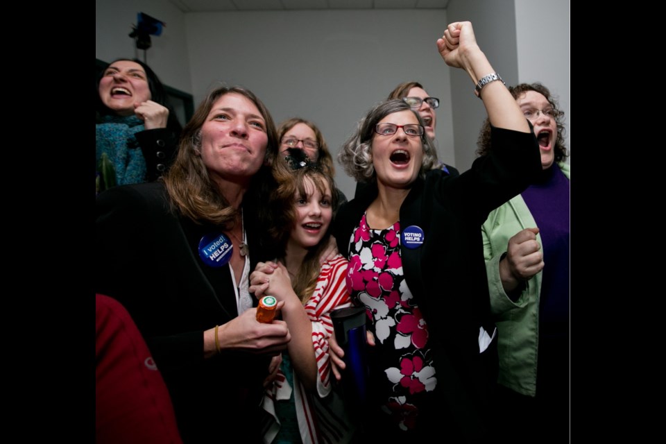 Victoria mayor-elect Lisa Helps celebrates with supporters at her campaign office Saturday night.