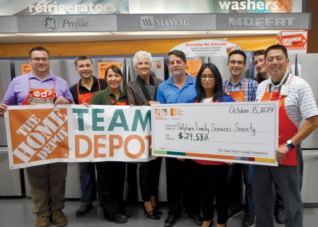 The Home Depot Park Royal store presents Hollyburn Family Services Society’s executive director Nanette Taylor and co-ordinator of youth services Paul Butler with a cheque for the North Shore Youth Safe House and Life Success programs. The funds are from a Home Depot Canada Foundation grant and an in-store fundraising campaign.