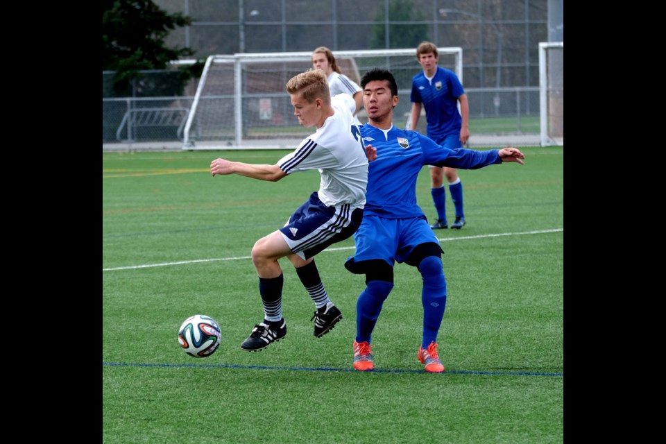 BC high school AA boys soccer final at Bby Lake fields west. Sa-hali ( white) vs SMU ( white)