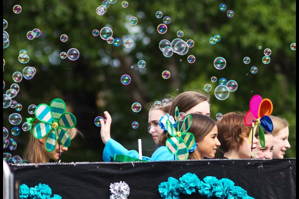 Bubbles rise up from the Irish Dancers' float in the Island Farms Victoria Day Parade.