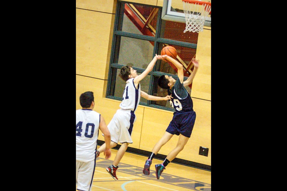 The Steveston-London Sharks Grade 9 boys basketball team entertained the Churchill Bulldogs in pre-season action last week at the "Shark Tank. The Vancouver took advantage of Steveston-London foul trouble and some key three-points to build up a second half lead and hold off the hosts for a 44-34 victory.