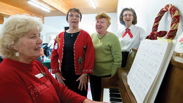 Shoppers at the Ladner United Christmas Village Bazaar were treated to some seasonal entertainment courtesy of Pat Rogers (left), Sandy Holland, Gwen Crowe and Helen Stevens.