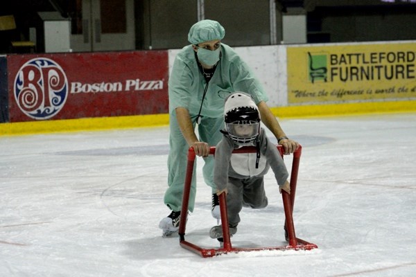 The Battlefords North Stars hosted their annual haunted skate Wednesday evening at the Civic Centre. Kids were given the opportunitiy to dress up in their costumes and skate alongside the North Stars. Some young skaters needed more help than others, like this shark getting a push from goaltender Spencer Tremblay.
