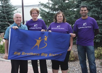 It&#8217;s Big Brothers Big Sisters (BBBS) Month in Yorkton, and a flag raising was held to commemorate the event. Pictured above (l-r) are Bob Maloney with the City of Yorkton, Irma Van de Bon, Executive Director BBBS, Amanda Ring and Abhinav Bhargav, also with Big Brothers and Big Sisters of Yorkton and area. Van de Bon says she hopes to see more people become  a mentor over the month, and make a difference in the lives of kids.