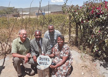 Vic Hamer has spent the past two years working to bring clean drinking water to remote locations in Kenya. He&#8217;s now working on another initiative that needs your support to see it through. Above he is pictured at left at a well site he saw through from beginning to end last year. The well was constructed in memory of Ruth and Hammer is pictured with her parents Paul and Leah Manyara and uncle Paul.