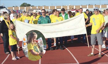 Yorkton&#8217;s Relay for Life event &#8211; held over the weekend &#8211; was a big success for the Canadian Cancer Society again this year, with 22 teams and over 250 participants raising $106,000 for cancer research. The relay is all about helping more people survive and thrive after cancer, and to celebrate the fact that over 65 survivors took part in the victory lap which opened the event. Cancer survivors also spoke about their experiences, including Luke Boechler, seven-time survivor Dionne Warner, and seven year-old Paige Hanson (inset photo). Janet Sharpe with the Canadian Cancer Society thanks everyone for their support, and encourages residents to get ready for next year&#8217;s relay.