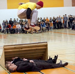 the aviva community fund recently presented the City of Yorkton with the big cheque for $150,000. The money will be used for the Yorkton Skateboard, Bike and Walking Park to be developed on Brodie Ave. Pictured above during a recent celebration event, Nathan Grayston, Co-chair of the Yorkton Skateboard Association, jumps over Joanne Lemma, Aviva Vice President of Business Development, Mayor James Wilson and Dave Nussbaumer of Farrell Agencies.